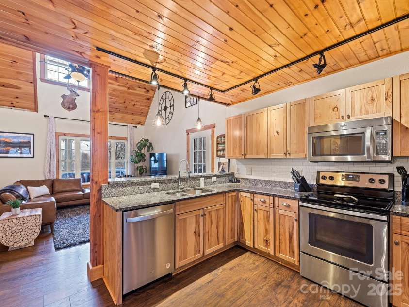61 Calm Creek Road, Waynesville, NC 28785.  MLS# CAR4213284, YatesRealty ID 8705. Open to the living room