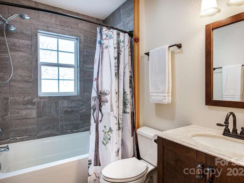 61 Calm Creek Road, Waynesville, NC 28785.  MLS# CAR4213284, YatesRealty ID 8705. Upstairs bath