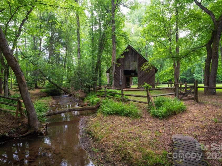 552 Avery Creek, Arden, NC 28704.  MLS# CAR4162380, YatesRealty ID 8706. 4-Stall Horse Barn