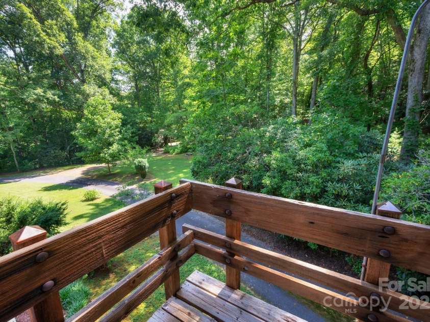 552 Avery Creek, Arden, NC 28704.  MLS# CAR4162380, YatesRealty ID 8706. Balcony off of Upstairs Bedroom