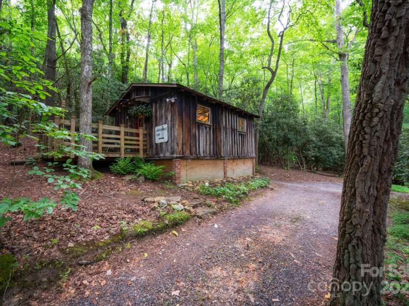 552 Avery Creek, Arden, NC 28704.  MLS# CAR4162380, YatesRealty ID 8706. Both Cabins Include Kitchenettes and Bathrooms
