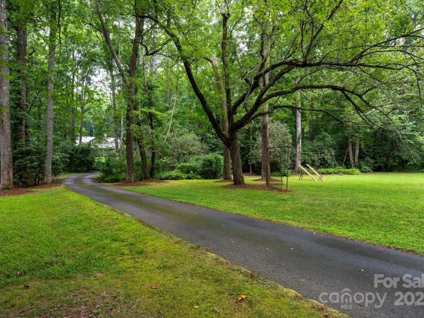 552 Avery Creek, Arden, NC 28704.  MLS# CAR4162380, YatesRealty ID 8706. Stunning Trees Throughout Property