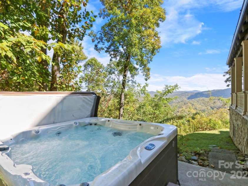 5742 NC Highway 194 None, Banner Elk, NC 28604.  MLS# CAR4309269, YatesRealty ID 871. Hot tub, adjacent to side patio!