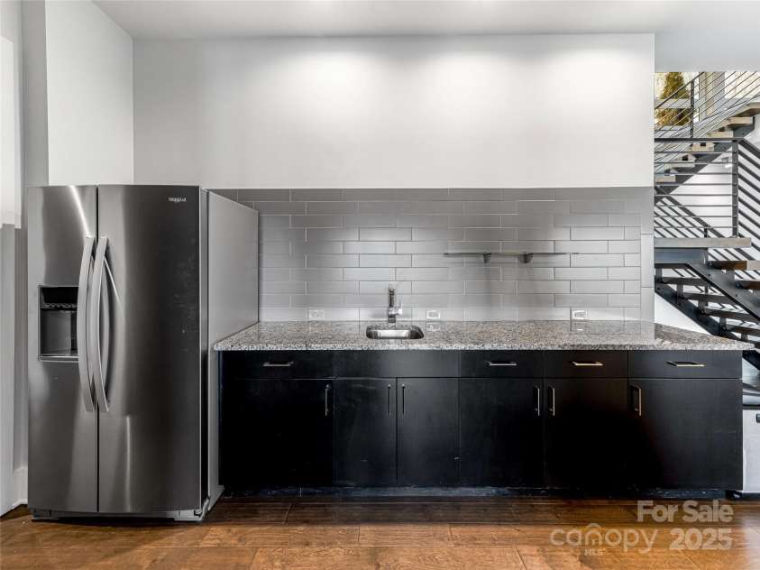 34 Grovepoint Way, Asheville, NC 28804.  MLS# CAR4228655, YatesRealty ID 8710. Lower level bar and refrigerator area.