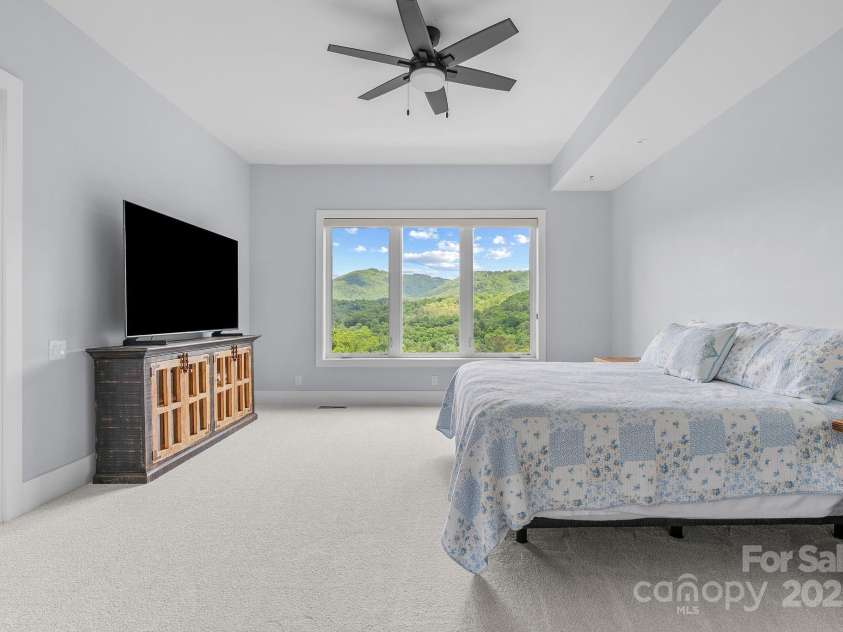 34 Grovepoint Way, Asheville, NC 28804.  MLS# CAR4228655, YatesRealty ID 8710. Lower level bedroom.