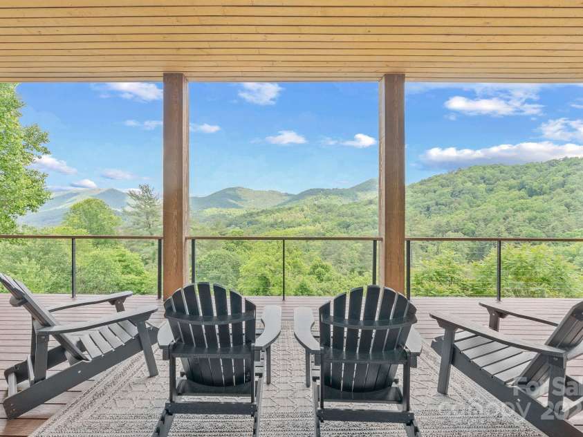 34 Grovepoint Way, Asheville, NC 28804.  MLS# CAR4228655, YatesRealty ID 8710. Lower level covered deck space with views!