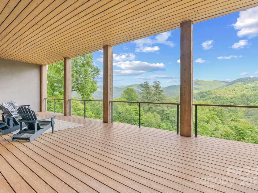 34 Grovepoint Way, Asheville, NC 28804.  MLS# CAR4228655, YatesRealty ID 8710. Lower level covered deck space with views!