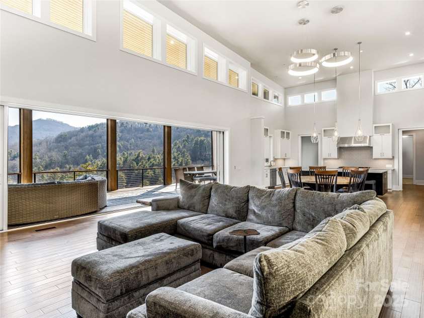 34 Grovepoint Way, Asheville, NC 28804.  MLS# CAR4228655, YatesRealty ID 8710. Winter view from main living area.