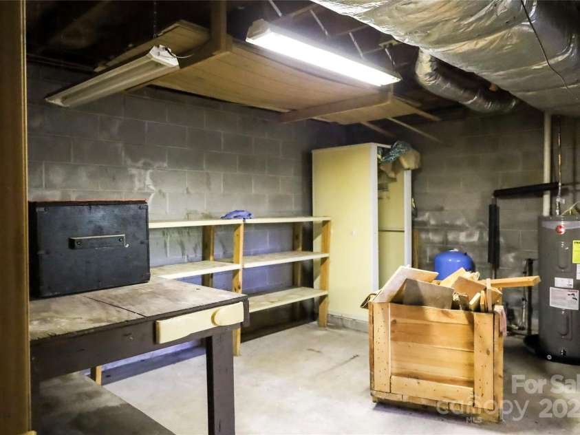 32 Windy Hollow Road, Asheville, NC 28806.  MLS# CAR4315574, YatesRealty ID 8712. Main level utility room