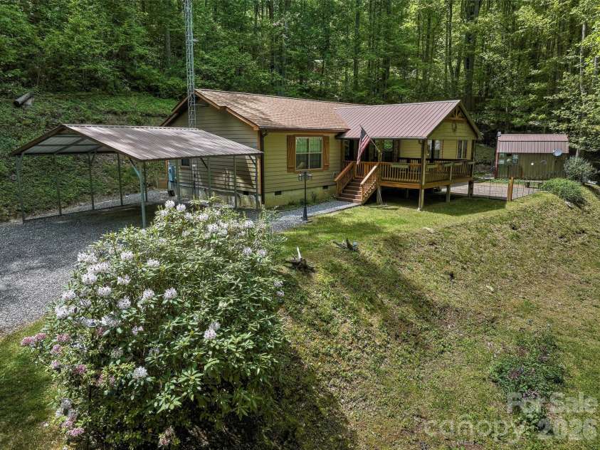 390 Camp Branch Road, Whittier, NC 28789.  MLS# CAR4344543, YatesRealty ID 8715. Gorgeous yard
