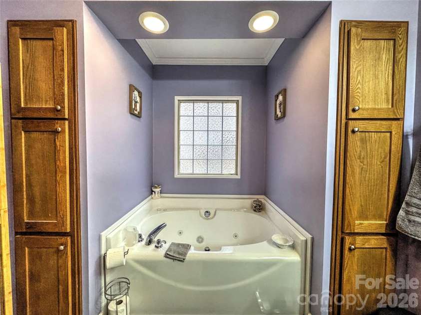 390 Camp Branch Road, Whittier, NC 28789.  MLS# CAR4344543, YatesRealty ID 8715. Master bath