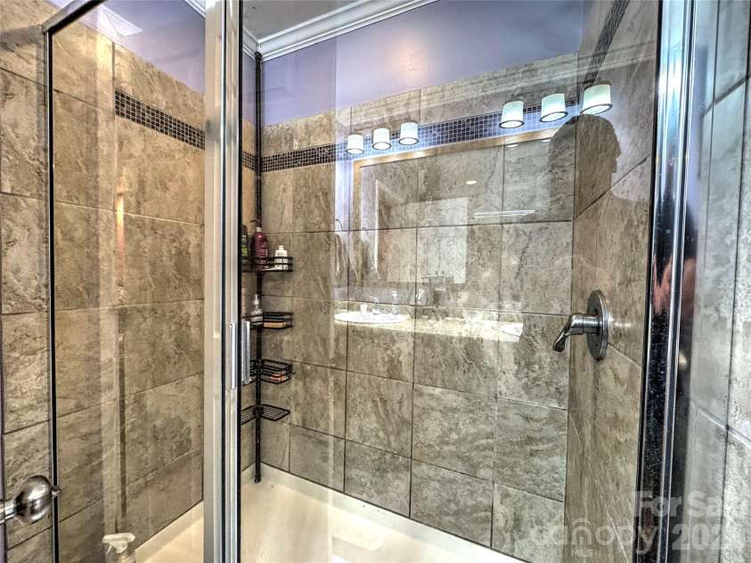 390 Camp Branch Road, Whittier, NC 28789.  MLS# CAR4344543, YatesRealty ID 8715. Master bath