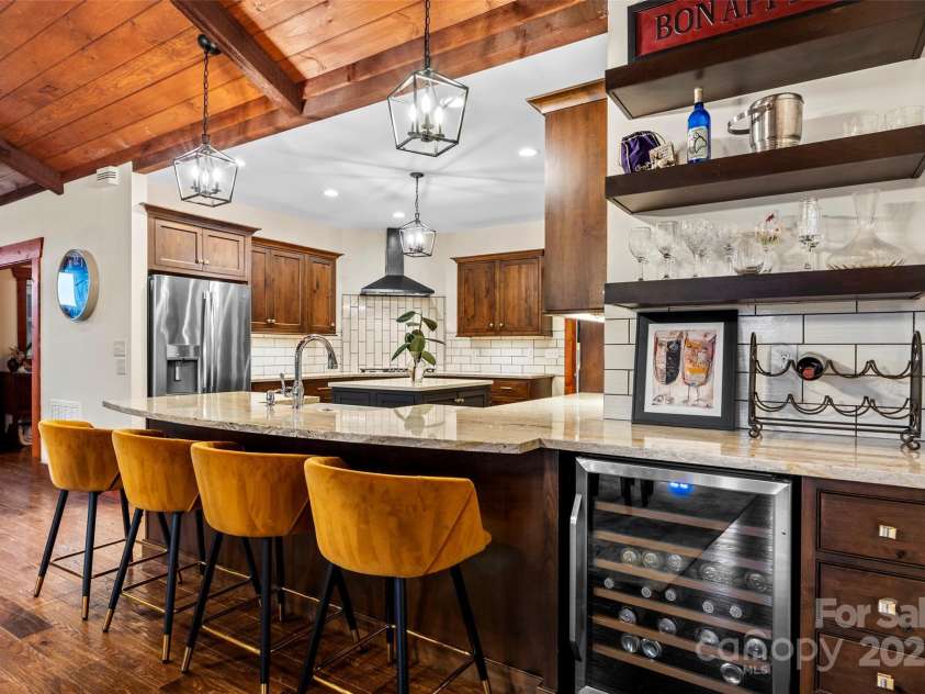49 Emory Paige Road, Weaverville, NC 28787.  MLS# CAR4243826, YatesRealty ID 8716. Breakfast Bar and wine cooler