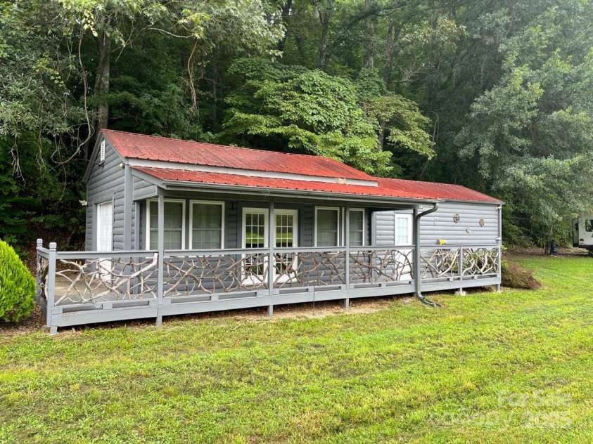 1961 Cane Creek Road, Fletcher, NC 28732.  MLS# CAR4233282, YatesRealty ID 8722. No restrictions and open use zoning allows many uses.