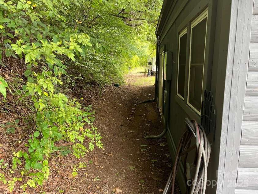 1961 Cane Creek Road, Fletcher, NC 28732.  MLS# CAR4233282, YatesRealty ID 8722. Rear windows and private break area.