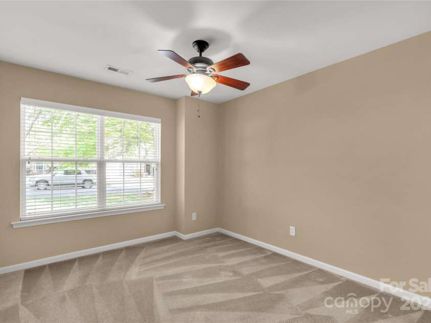 3411 Xandra Court, Indian Land, SC 29707.  MLS# CAR4242708, YatesRealty ID 8725. Bedroom 3 with large window facing the front of the home