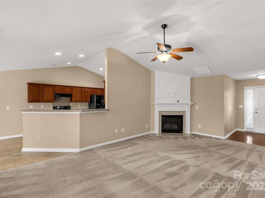 3411 Xandra Court, Indian Land, SC 29707.  MLS# CAR4242708, YatesRealty ID 8725. Great room leads to open kitchen with peninsula