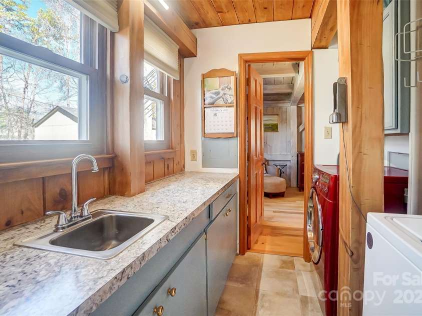 2139 Peninsula Drive, Clover, SC 29710.  MLS# CAR4223989, YatesRealty ID 8730. Laundry room with sink and storage