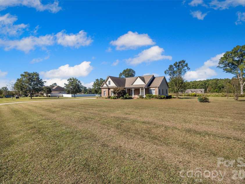 310 Clarendon Estates Drive, Clover, SC 29710.  MLS# CAR4305120, YatesRealty ID 8730. 1 acre yard