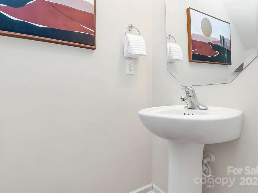 137 Woodbridge Circle, Mount Holly, NC 28120.  MLS# CAR4222548, YatesRealty ID 8731. Downstairs powder room.