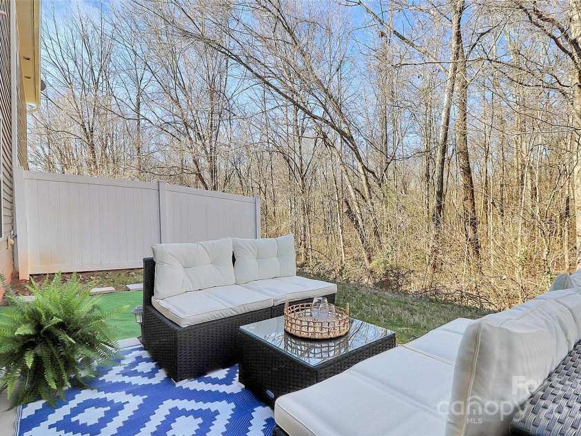 137 Woodbridge Circle, Mount Holly, NC 28120.  MLS# CAR4222548, YatesRealty ID 8731. Quiet, large, PRIVATE back yard patio backing up to woods.