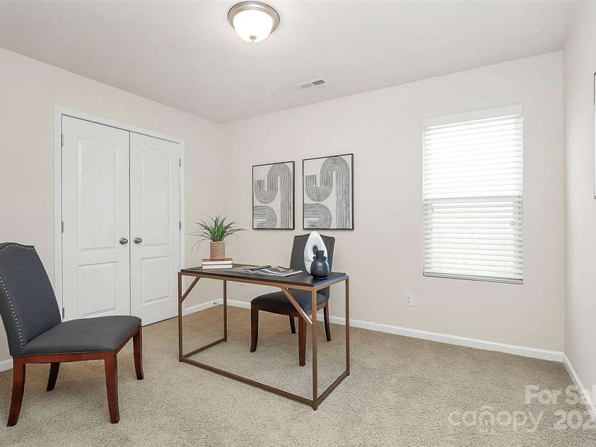 137 Woodbridge Circle, Mount Holly, NC 28120.  MLS# CAR4222548, YatesRealty ID 8731. Versatile flex space for an in-home office, gym, playroom... whatever you need it to be! Could even be closed off to make a fourth bedroom.