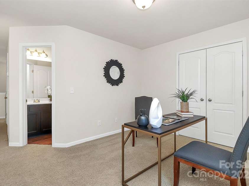 137 Woodbridge Circle, Mount Holly, NC 28120.  MLS# CAR4222548, YatesRealty ID 8731. Versatile flex space for an in-home office, gym, playroom... whatever you need it to be! Could even be closed off to make a fourth bedroom.