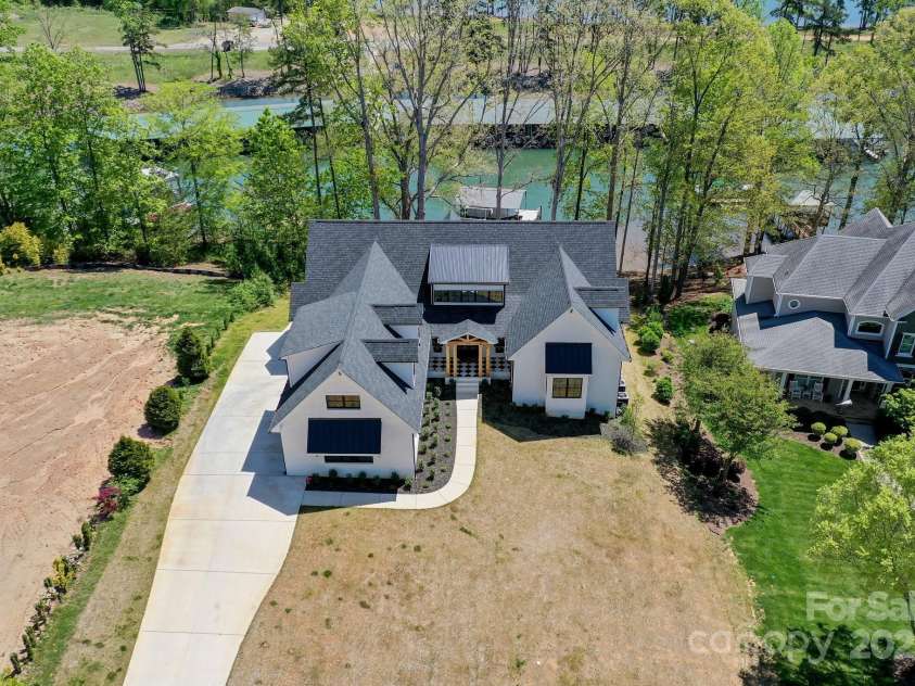 153 High Hills Drive, Mooresville, NC 28117.  MLS# CAR4246842, YatesRealty ID 8735. Aerial view of the.58ac Waterfront lot