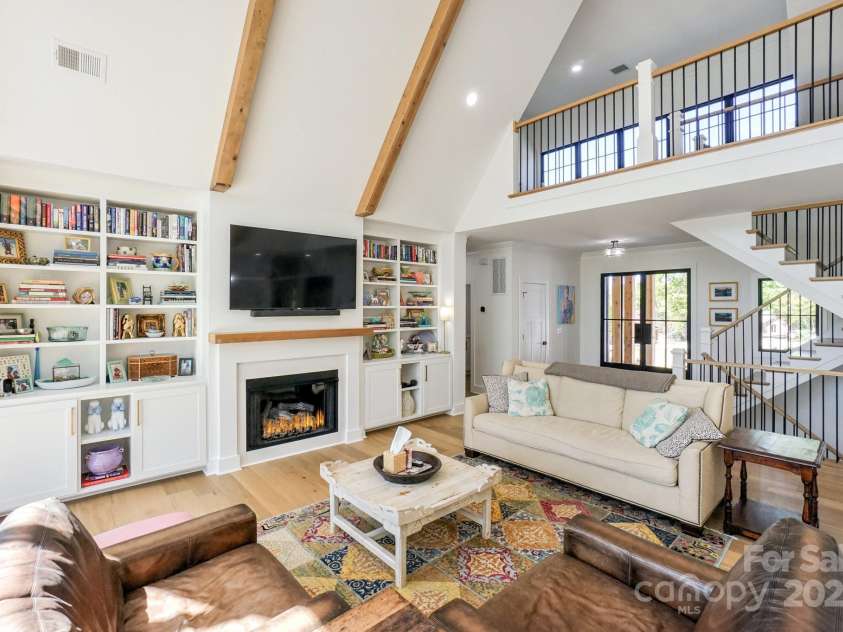 153 High Hills Drive, Mooresville, NC 28117.  MLS# CAR4246842, YatesRealty ID 8735. Beautiful builtins surround the gas fireplace
