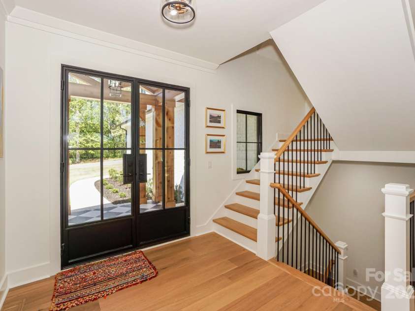 153 High Hills Drive, Mooresville, NC 28117.  MLS# CAR4246842, YatesRealty ID 8735. Custom Iron and Glass front door