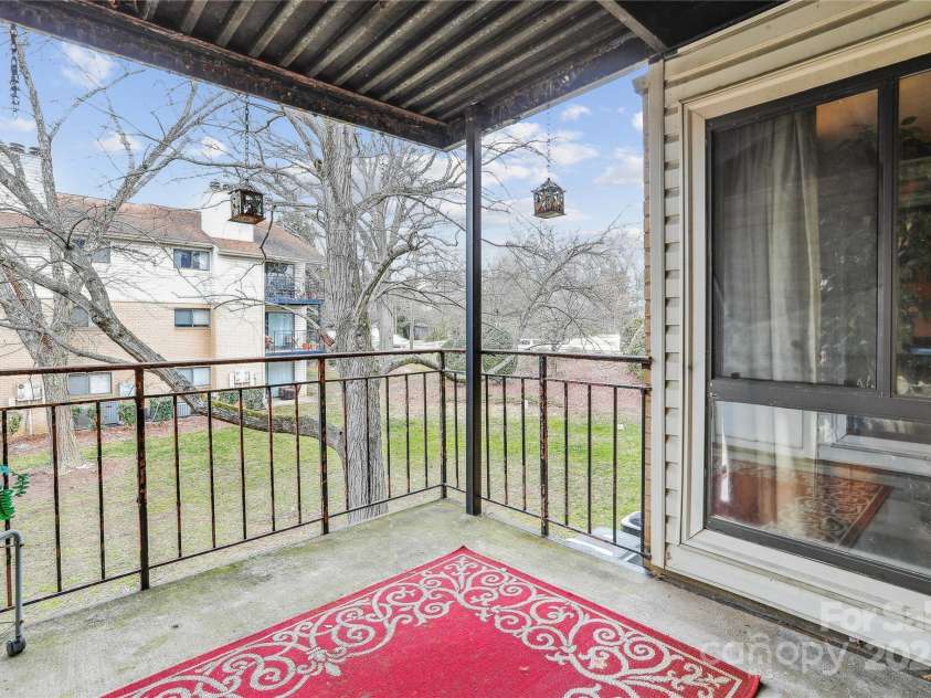 4811 Spring Lake Drive, Charlotte, NC 28212.  MLS# CAR4225358, YatesRealty ID 8737. Large covered balcony