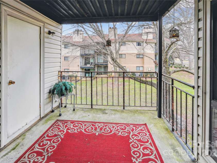 4811 Spring Lake Drive, Charlotte, NC 28212.  MLS# CAR4225358, YatesRealty ID 8737. Large storage room off balcony
