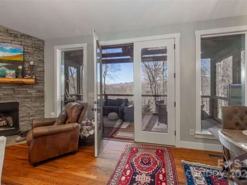 126 Mossycup Court, Tuckasegee, NC 28783.  MLS# CAR4324867, YatesRealty ID 874. Entering the back deck