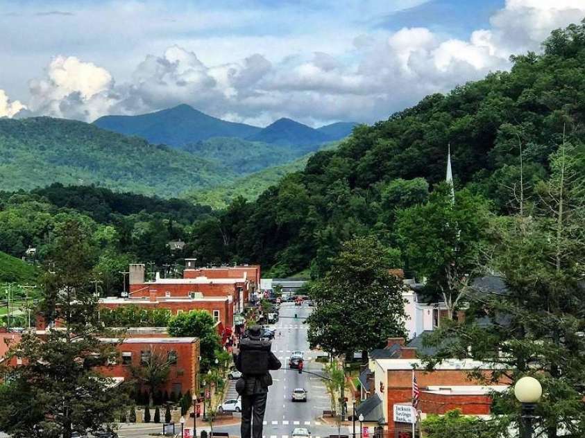 126 Mossycup Court, Tuckasegee, NC 28783.  MLS# CAR4324867, YatesRealty ID 874. Historic Downtown Sylva, shopping, breweries, live music and dining!