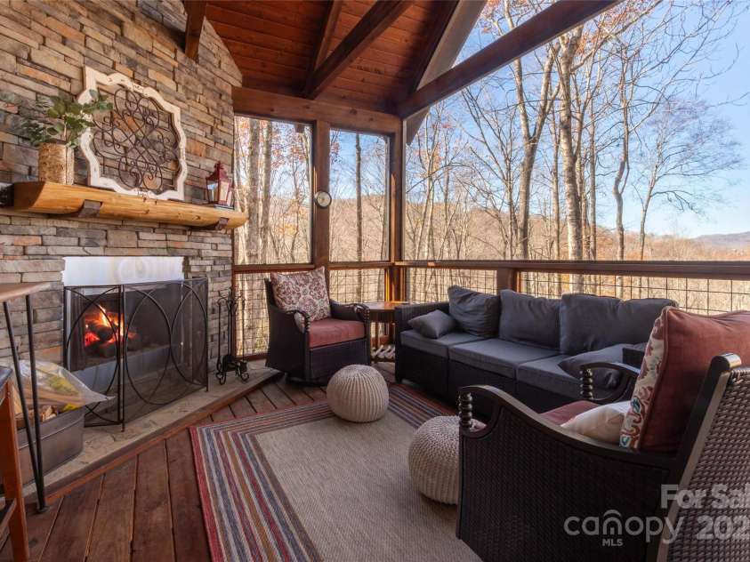 126 Mossycup Court, Tuckasegee, NC 28783.  MLS# CAR4324867, YatesRealty ID 874. Relax by the fire - read a book, take a nap!  Wired for TV as well!