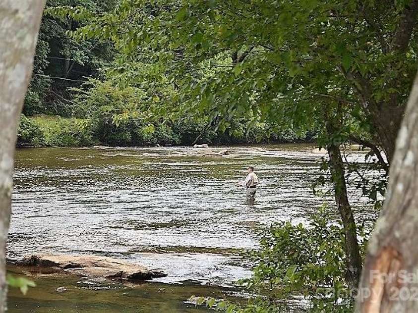 126 Mossycup Court, Tuckasegee, NC 28783.  MLS# CAR4324867, YatesRealty ID 874. World Class Fly Fiishing on the Tuckasegee!
