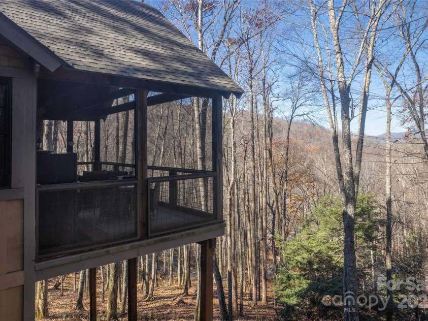 126 Mossycup Court, Tuckasegee, NC 28783.  MLS# CAR4324867, YatesRealty ID 874. Year round views!