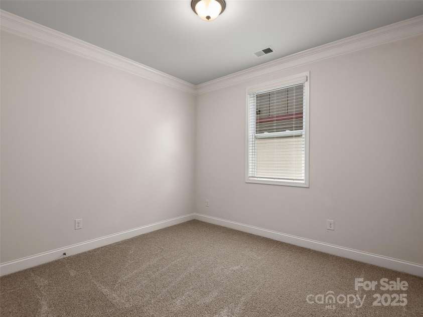 602 Summerfield Place, Flat Rock, NC 28731.  MLS# CAR4276322, YatesRealty ID 8744. 4th Bedroom 10'4