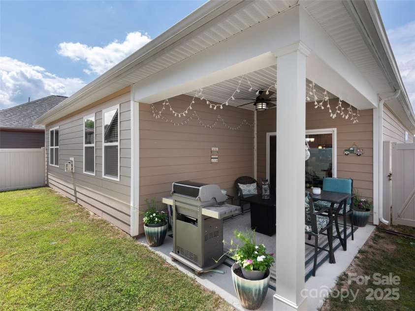 602 Summerfield Place, Flat Rock, NC 28731.  MLS# CAR4276322, YatesRealty ID 8744. Nice covered patio!