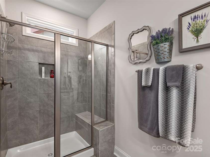 602 Summerfield Place, Flat Rock, NC 28731.  MLS# CAR4276322, YatesRealty ID 8744. Step in Shower