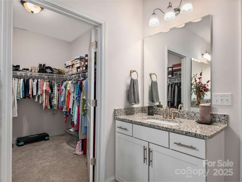 602 Summerfield Place, Flat Rock, NC 28731.  MLS# CAR4276322, YatesRealty ID 8744. Two sinks with granite counters