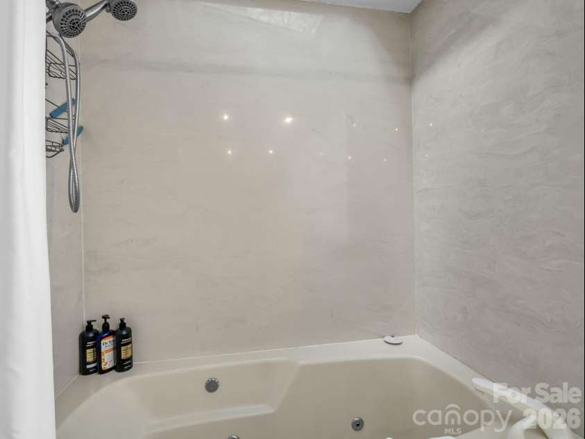456 Youngs Mountain Drive, Lake Lure, NC 28746.  MLS# CAR4356097, YatesRealty ID 8748. Hall Bathroom