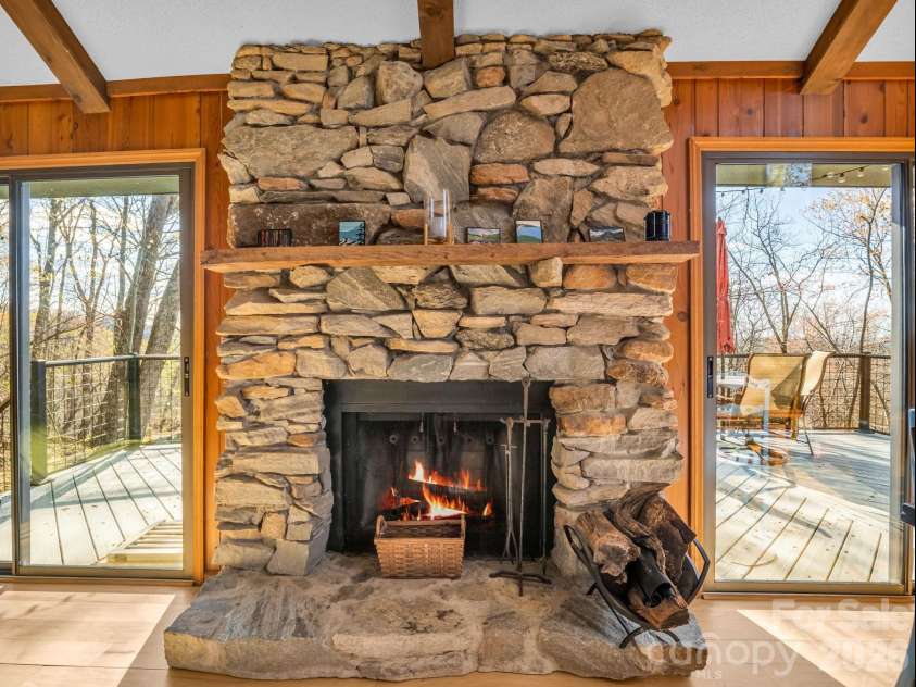456 Youngs Mountain Drive, Lake Lure, NC 28746.  MLS# CAR4356097, YatesRealty ID 8748. Stone Fireplace