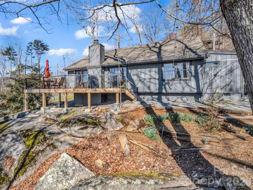 456 Youngs Mountain Drive, Lake Lure, NC 28746.  MLS# CAR4356097, YatesRealty ID 8748. This home offers unmatched character