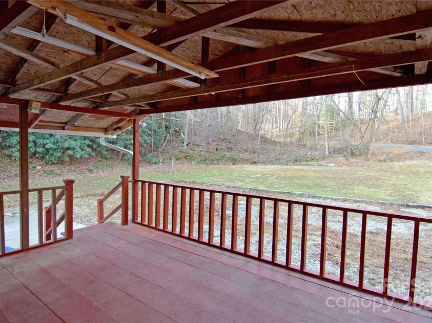 93 John Gilkey Road, Marion, NC 28752.  MLS# CAR4333548, YatesRealty ID 8750. Covered deck