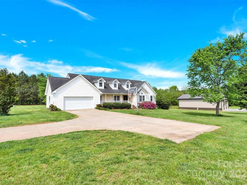 365 Kinder Road, Harmony, NC 28634.  MLS# CAR4243617, YatesRealty ID 8755. 2-Car Garage and Driveway with Turn-Around or Extra Parking Area