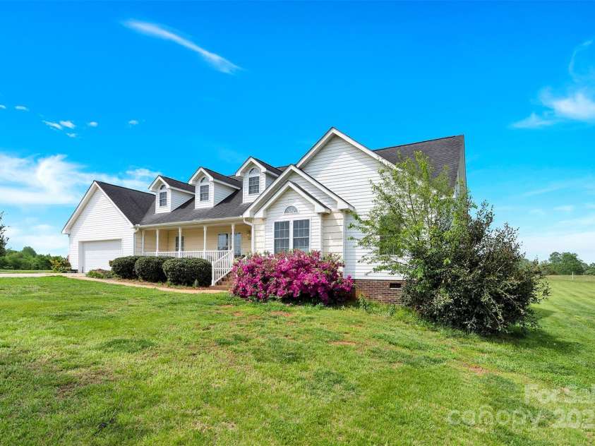 365 Kinder Road, Harmony, NC 28634.  MLS# CAR4243617, YatesRealty ID 8755. Beautiful Azaleas in the Spring!