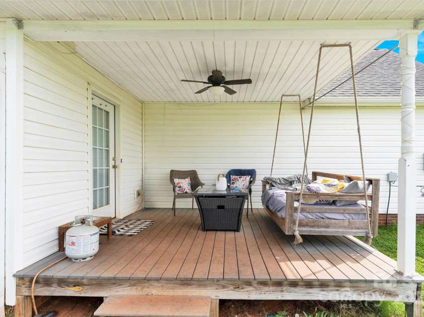 365 Kinder Road, Harmony, NC 28634.  MLS# CAR4243617, YatesRealty ID 8755. Covered Back Porch
