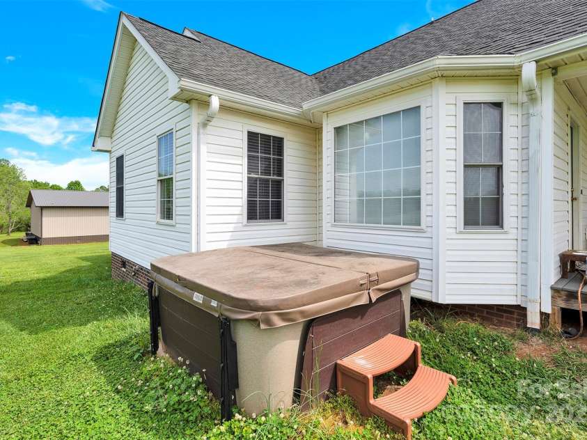 365 Kinder Road, Harmony, NC 28634.  MLS# CAR4243617, YatesRealty ID 8755. Hot Tub
