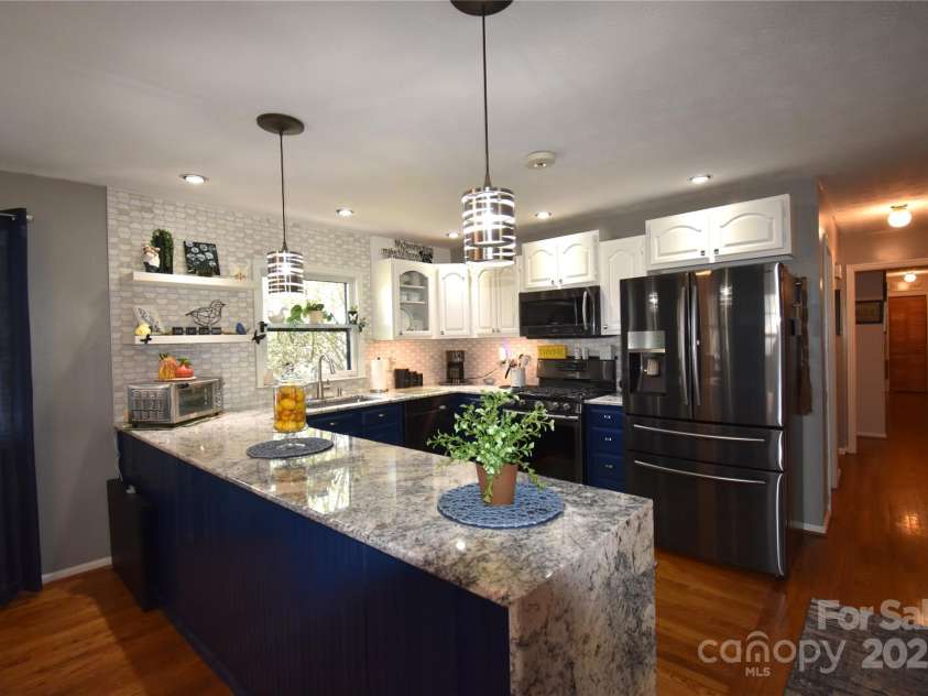 37 Hillside Drive, Etowah, NC 28729.  MLS# CAR4243156, YatesRealty ID 8761. Beautiful waterfall edge countertop